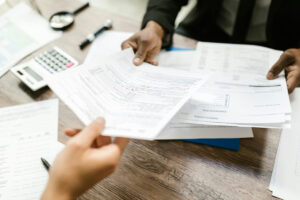 Person reviewing investigation documents